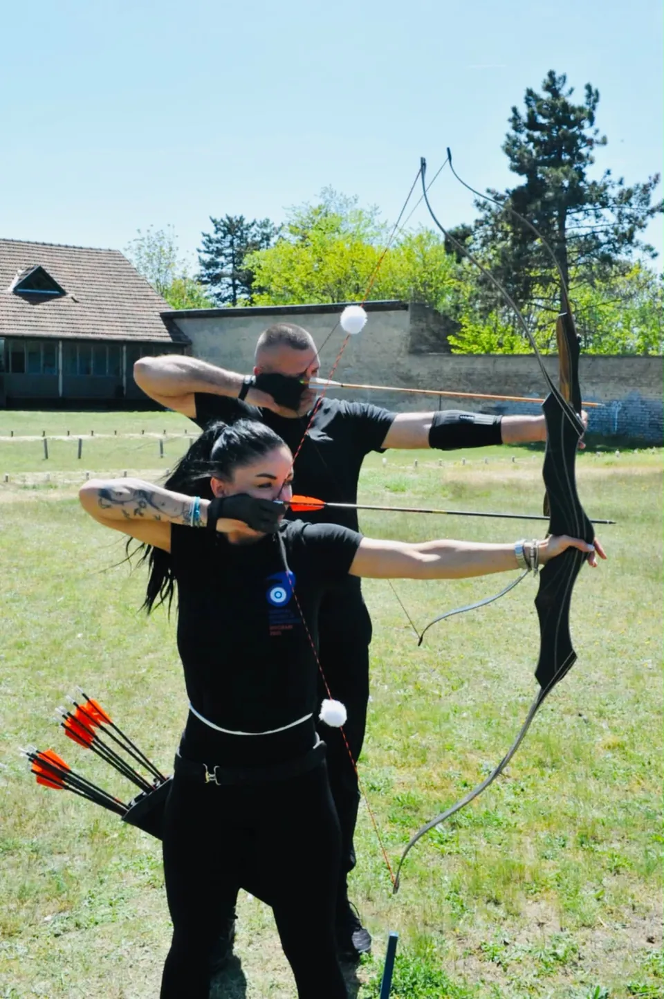 Tatjana Ergen drawing her bow on a 3D course